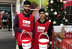 Pictured are Aqib Ahmed and Ghalib Ahmed, members of Ahmadiyya Muslim Youth Oldham