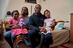 New research has found that 131,000 children in Britain are now homeless. Pictured are Telli Afrik and his family.

Image courtesy of Steve Franck 