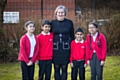 Roundthorn Primary Executive Primary School Executive Principal Lisa Needham with some of her happy pupils