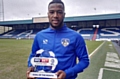 EFL Goal of the Month winner Duckens Nazon proudly shows off his award