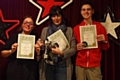 Catherine Charnock, her son Luke, and Diane Drinkwater show off their beekeeping awards