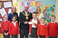 The Mayor of Oldham, Councillor Shadab Qumer, visited Knowsley Primary School to collect a cheque for £100  Children pictured are (left to right): Alicia Harrop, Sumayyah Alyas, Maisie Comer (Chair of the School Council - presenting the cheque), Joseph Baines and Finley Hampshire. The adults are (left to right): Miss Vanessa Payne (Headteacher) and Mrs Asia Anderson (Charities Co-ordinator and Year 4 teacher).