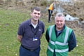 Community Payback supervisor Val Barker is photographed (in green) alongside Groundwork’s Timothy Lloyd at a local project