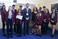 MP Jim McMahon with pupils at Hathershaw College