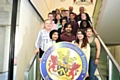 Pictured are members of Oldham Youth Council (front), Oldham Council Youth Service workers (back) and Stephen Lowe, Deputy Lieutenant of Greater Manchester (back, right).