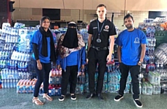 Volunteers from the Oldham Alkhair Foundation at a Saddleworth Moor site