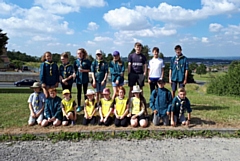 Scouts and brownies line-up after their epic litter pick