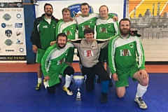 The jubilant Emmaus Mossley team celebrate their futsal victory