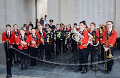 Dobcross Youth Band pictured at the Menin Gate Memorial to the Missing in Ypres