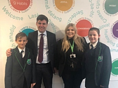 Head Boy Szymon Barszcz (left) and Head Girl Katie May-Bowles (right), with Greater Manchester Mayor Andy Burnham (centre-left) and Oasis Academy Leesbrook Principal Sarah Livesey (centre-right).