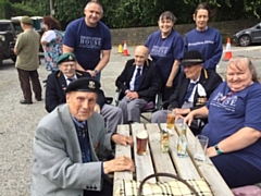 Day out for the veterans (back row): Royal Marine Commando George Sims, D-Day veteran, Paul and Sue Greenlees from Broughton House behind Ron Berry (Royal Navy), then carer Gaynor Anderson, who is behind Ken Ashworth (Royal Artillery), another D-Day veteran, April Jolly, carer and activities coordinator.