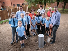 (From left): FCHO's Jamie Smith, teacher Miss Wood, Head Miss Bowers, Cllr Roberts and FCHO's Reece Cumiskey with some of the Thorp Road pupils