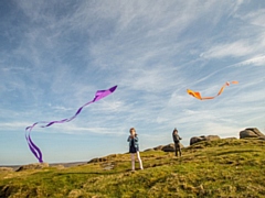 Children fly kites on a sunny day in the South Pennines. Pic courtesy of Craig Shaw.