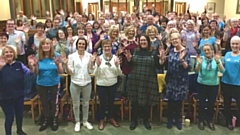 Gemma Cunliffe (centre) loved attending a Tuneless Choir in Nottingham.