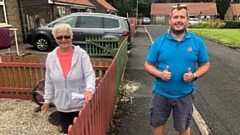 Resident Hilda Moffett (left) with Graham Rogers from the Salvation Army during a singo bingo session