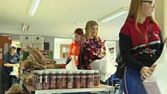 Volunteers sorting food for the new partnership