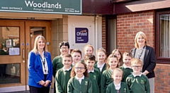 Happy staff and pupils at Woodlands Primary Academy