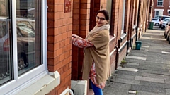 Saba Kazmi delivering cards to pupils