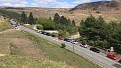 This picture, taken shortly after 2pm yesterday afternoon, highlights how motorists completely ignored the no parking signs on the main A635 Greenfield to Holmfirth Road at Binn Green