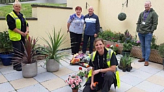 First Choice Homes Oldham (FCHO) and Booths Garden Centre have donated plants, soil and planters to get the community garden in Littlemoor growing again