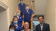 Dr Zahid Chauhan (right of picture) with employees from the Oakdene Nursing Home in Lees