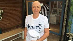 Maria Booth is pictured following her charity head shave