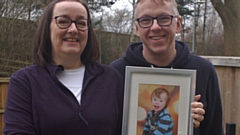 Karen and Mark Shurba with son Alex featured in the photograph 