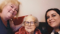 Shelia is pictured (centre) flanked by friends Jenni Winland and Julie Hardington