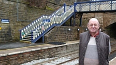 Liberal Democrat councillor Kevin Dawson is pictured at Greenfield station