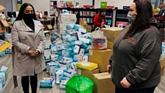 Councillor Arooj Shah is pictured visiting a local foodbank in Oldham