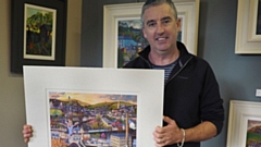 Chris Cyprus with his Old Milltown artwork