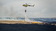 Firefighters battle the most recent fire on Marsden Moor in April 2021. Image courtesy of National Trust Images/Victoria Holland