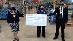 Rose Knipe is pictured presenting the £150 cheque to Cllr Shaid Mushtaq and the Mayor, Cllr Jenny Harrison