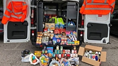 An Openreach van full of collected food items