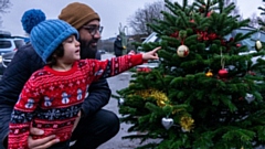 Choosing a Christmas tree at Marsden Moor. Image courtesy of National Trust Images/Victoria Holland