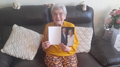 Mary with her treasured card from King Charles III and Camilla, the Queen Consort