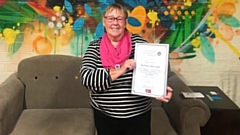 Emmaus Mossley volunteer Barbara Heywood with her RVS Platinum Champions Award