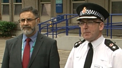 Oldham police's Chief Superintendent Chris Bowen (right) is pictured with council chief Sayyed Osman