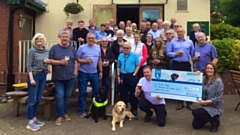 The £10,000 cheque presentation for the Name the Puppy, Change a Life appeal at the Rose of Lancaster