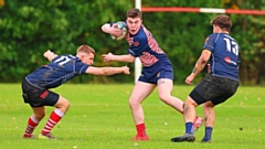 Oldham's Lewis Ward in the thick of the action