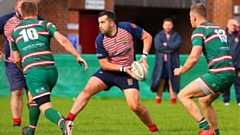 Oldham's Josh Watson makes a pass