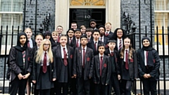 Students outside the famous door of 10 Downing Street