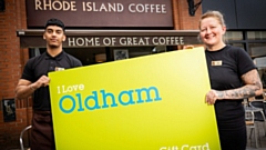 Staff at Rhode Island Coffee in Spindles Shopping Centre with the Oldham gift card