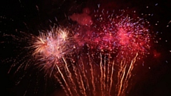 A vibrant fireworks display illuminates the night sky for Oldham Temple's Diwali celebrations