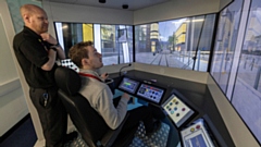 Reporter George Lythgoe trains to become a tram driver on the simulator at Queen's Road Depot in Cheetham Hill