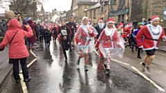 A scene from yesterday's memorable but howling rain and wind-affected Santa Dash