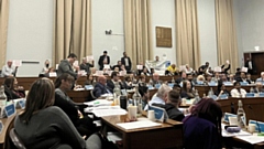 Demonstrators can be seen at the full Council meeting on March 13. Image courtesy of Charlotte Hall / MEN