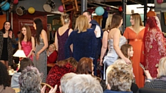 Models on the catwalk at Emmaus Mossley's fashion show. Image courtesy of Phil Grainger