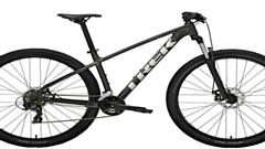 The bike - similar to this one - is a black Trek pedal bike