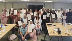 Pictured are local women receiving their certificates